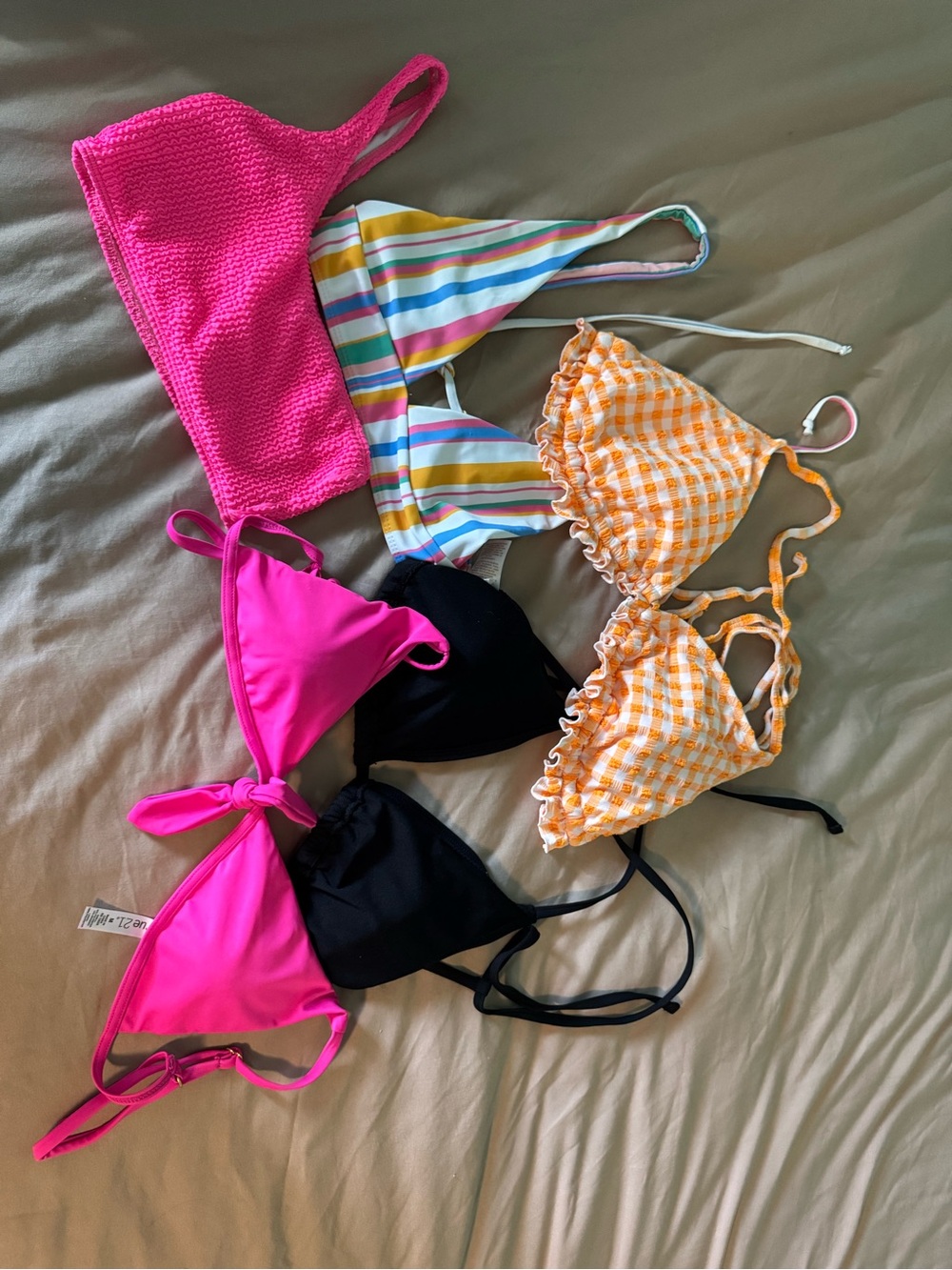 Variety of brand and size bikini tops